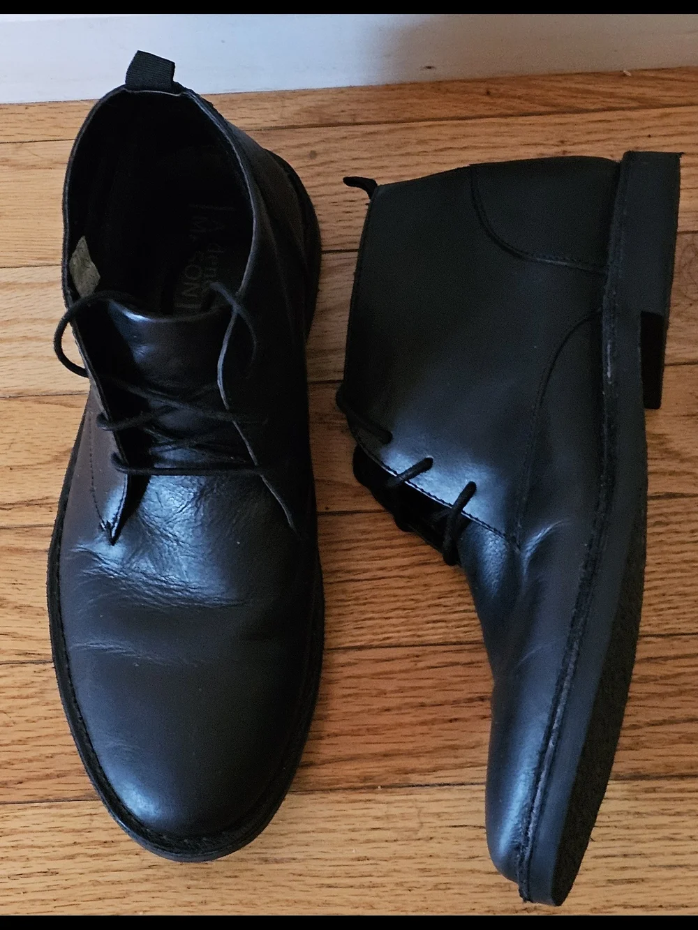 Men’s short dress boots.  Black leather.  Worn a couple of times Sz 9